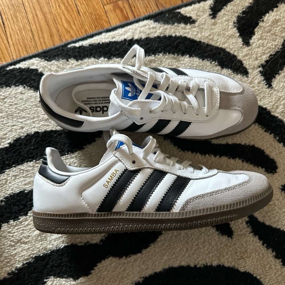 White and black Adidas Sambas, size Men’s US 7 / Women’s US 8
